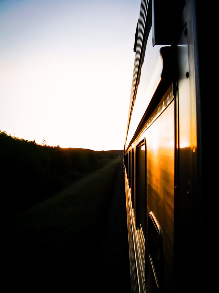 Sun sets on a Budd Car, somewhere in Alberta, 11 September 2002
