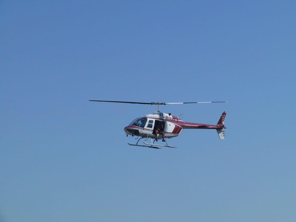 Daryl gets his video of the train 10 minutes southeast of Ottawa, Ontario, 26 September 2002