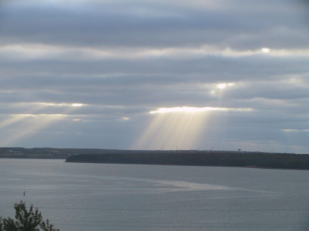 Crepuscular clouds over Bras D'Or Lake, Nova Scotia, 9 October 2002